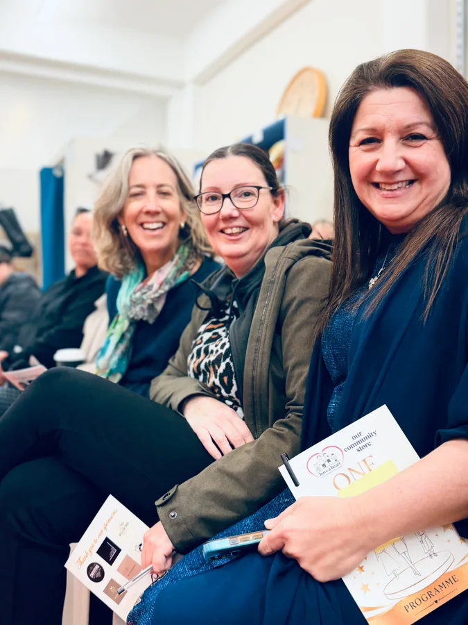 Guests seated together at a fashion event